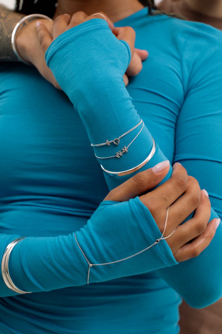 Hand chain with silver bracelets